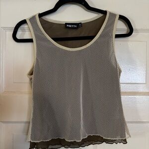 Small mesh like cream under grey tank
Fits well good fabric